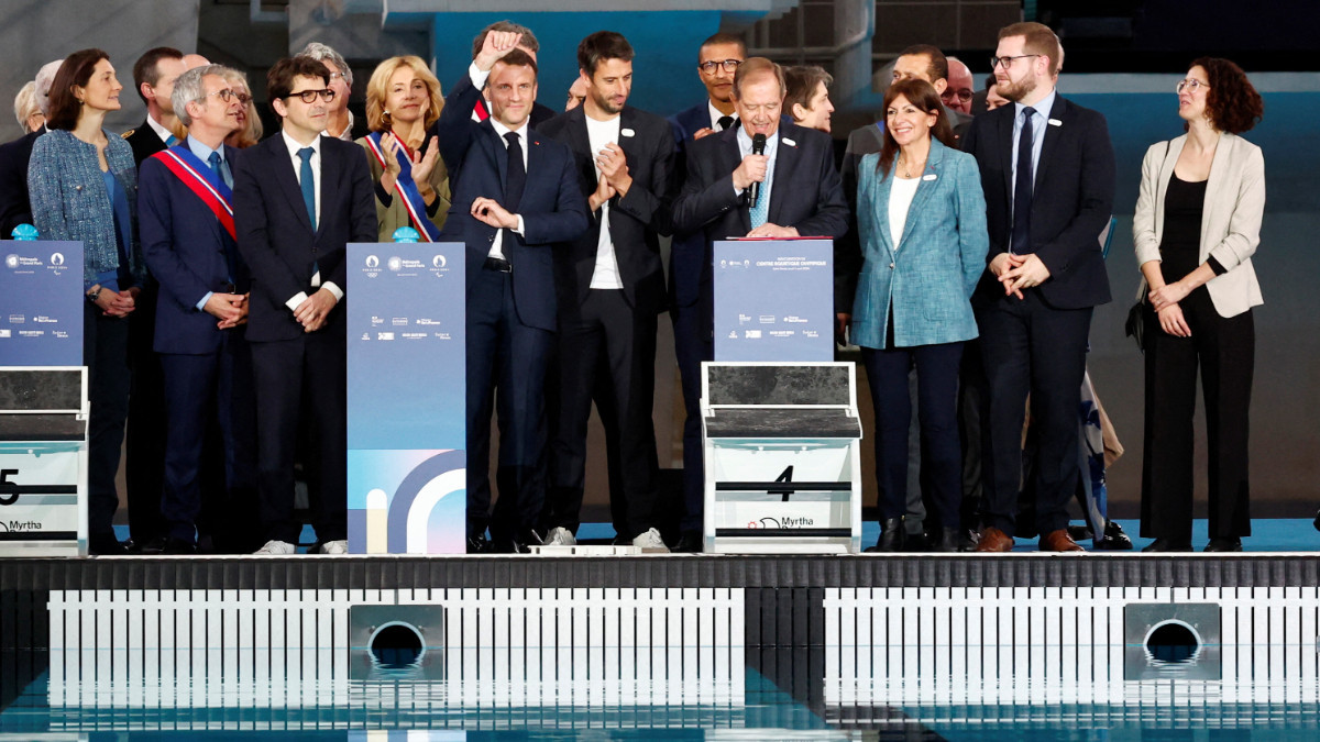 French authorities at the inauguration of the Olympic Aquatics Centre in Paris. GETTY IMAGES