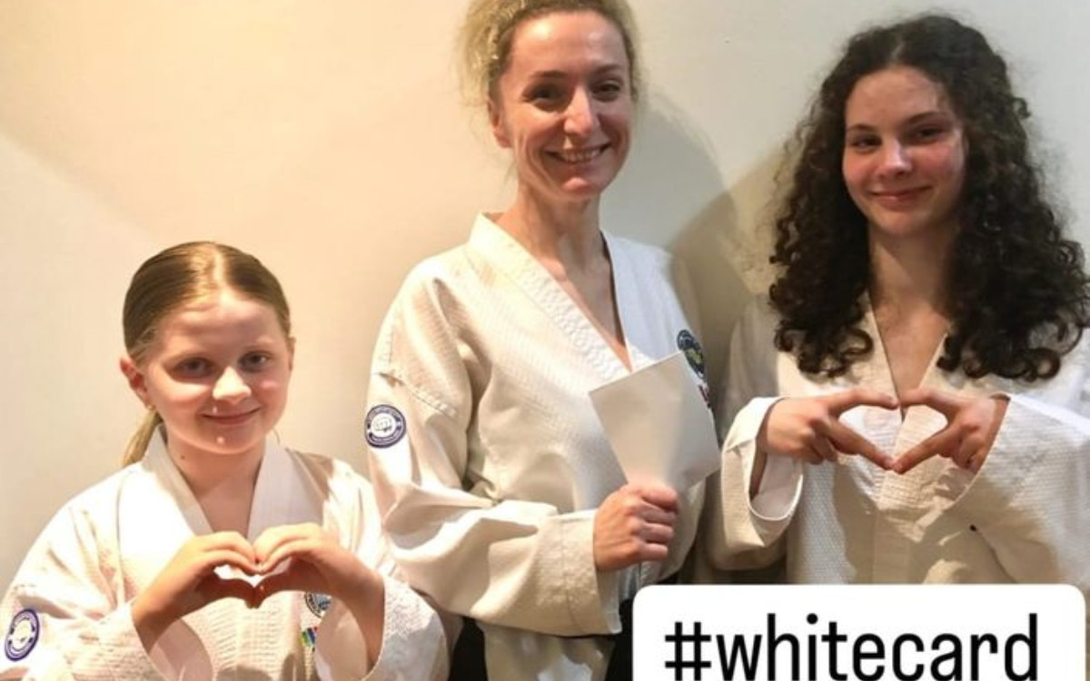 ITF members share their photos with a white card as a clear symbol. ITFTKD.