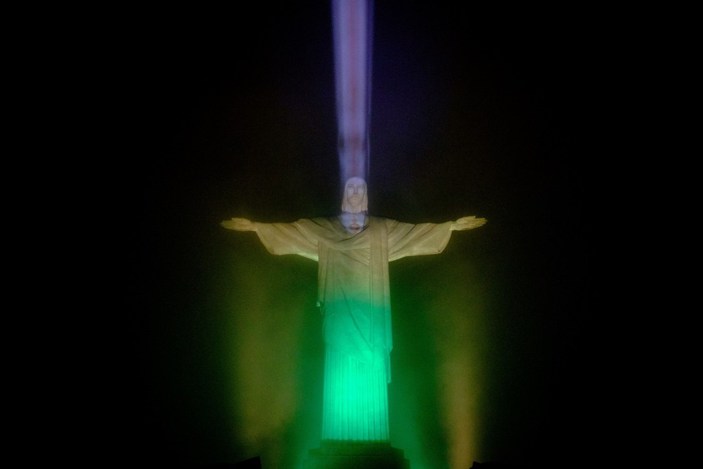 The Christ the Redeemer statute overlooking Rio was lit up in the colours of the Brazilian flag ©Getty Images 