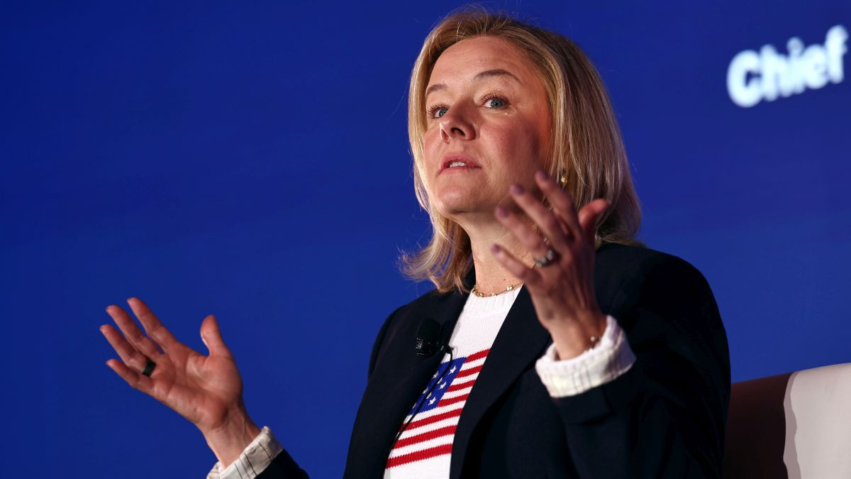 Sarah Hirshland, CEO of United States Olympic & Paralympic Committee,, speaks to the media. GETTY IMAGES