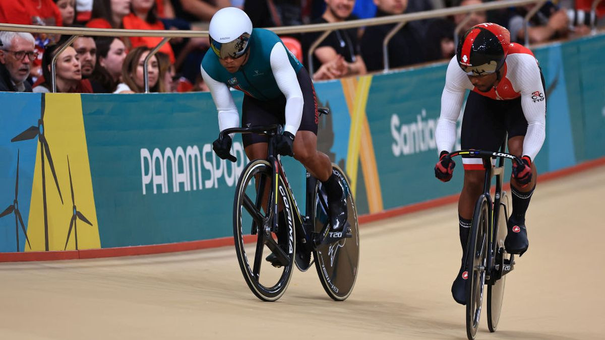 Nicholas Lee Paul competes with Jair Tjon En Fa in the Men's Sprint Final race in Track Cycling at the Parque Peñalolen in Santiago 2023 Pan Am Games. GETTY IMAGES