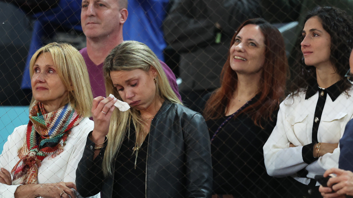 Rafael Nadal's mother Ana Maria Parera (L), sister Maria Isabel Nadal (C), and wife Maria Francisca Perello (R) listen to his farewell speech. GETTY IMAGES