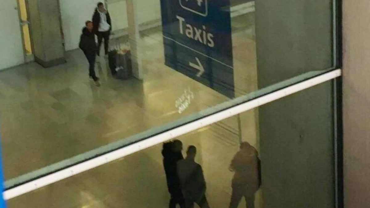 At airport departures, underground taxis wait for tourists