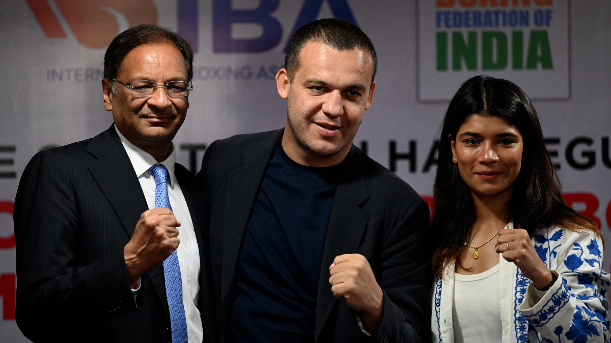 Umar Kremlev with Boxing Federation of India president Ajay Singh and world champion Nikhat Zareen. GETTY IMAGES