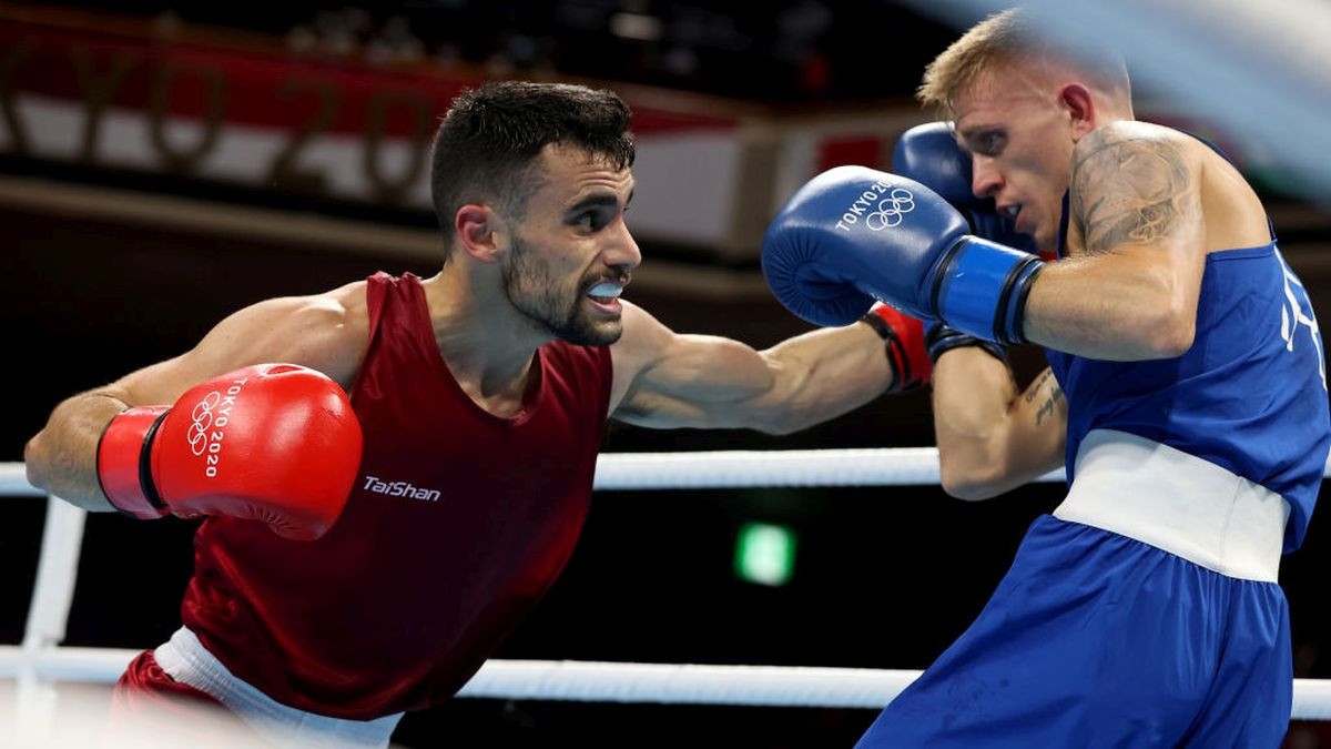 Jose Quiles of Spain (L) exchanges punches with Kurt Anthony Walker of Ireland during the Men's Feather (52-57kg) in Tokyo 2020 Olympic Games July 2021. GETTY IMAGES