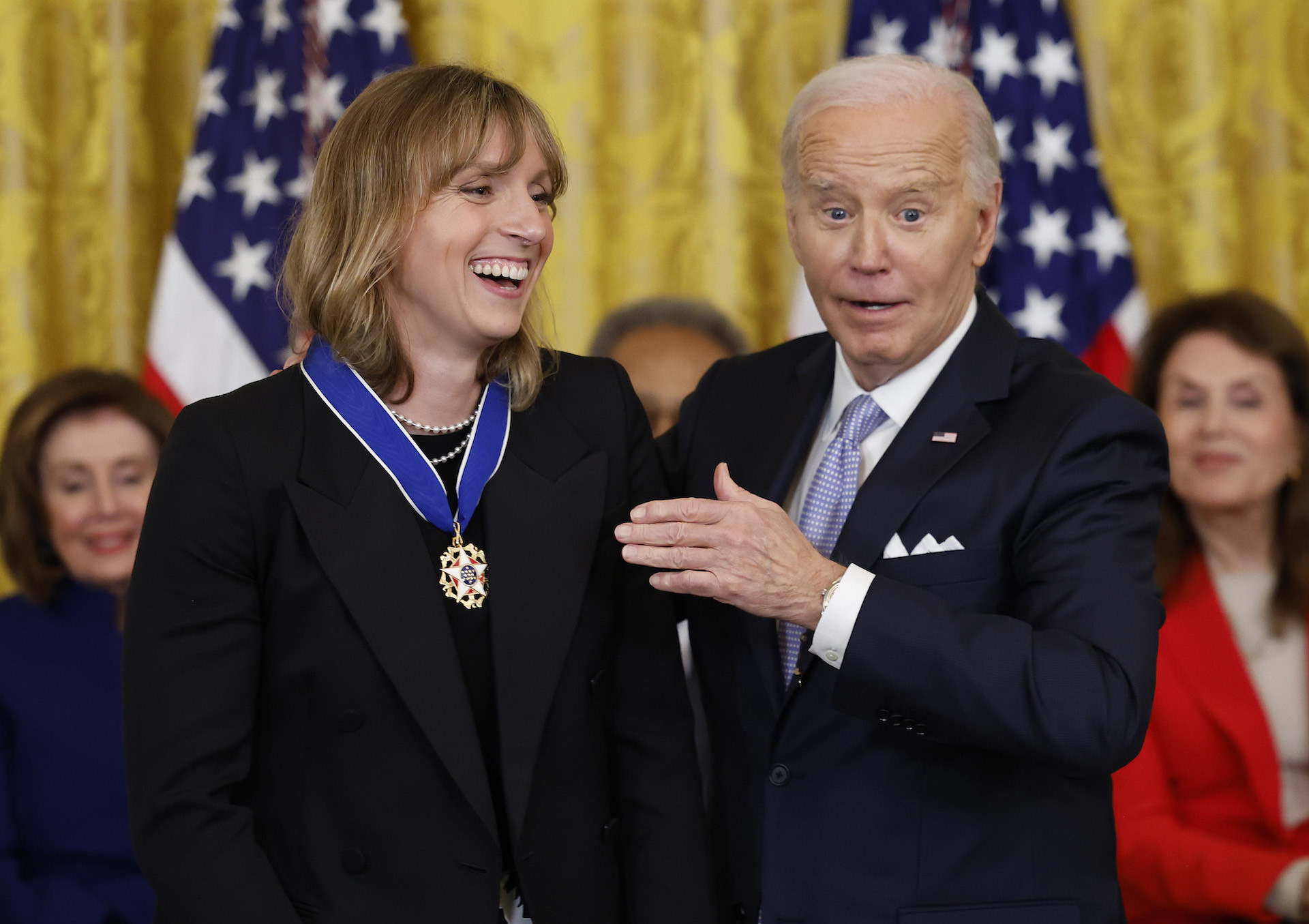 Joe Biden awards Katie Ledecky the Presidential Medal of Freedom. GETTY IMAGES
