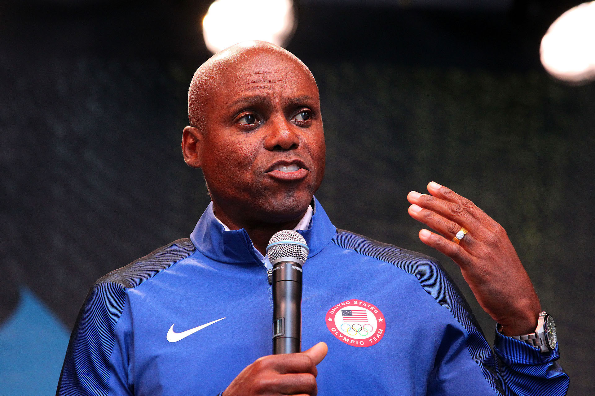 Carl Lewis speaks at a Team USA road tour. GETTY IMAGES