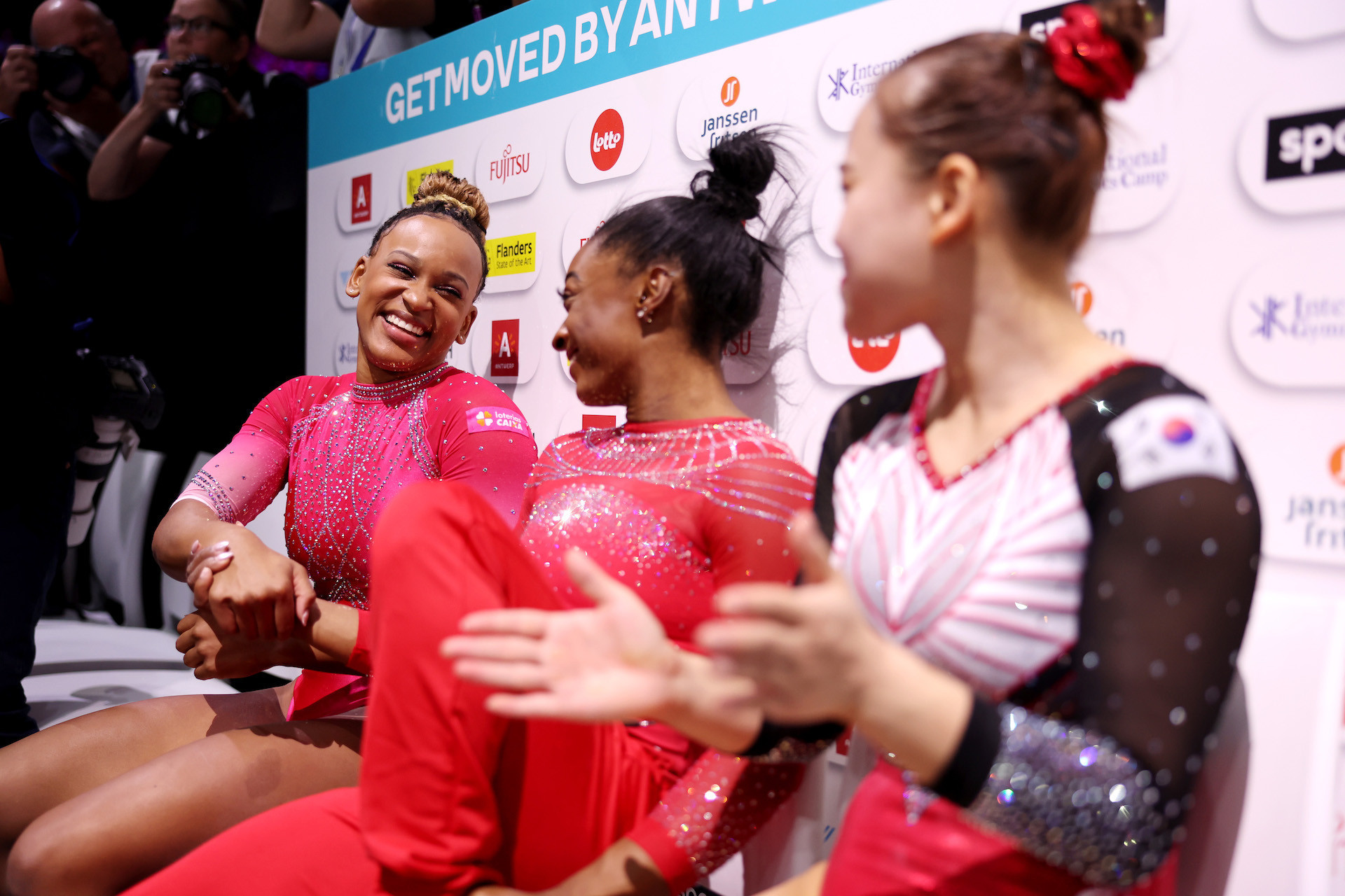 Rebeca Andrade celebrates with Simone Biles and Seojeong Yeo at the 2023 Artistic Gymnastics World Championships. GETTY IMAGES
