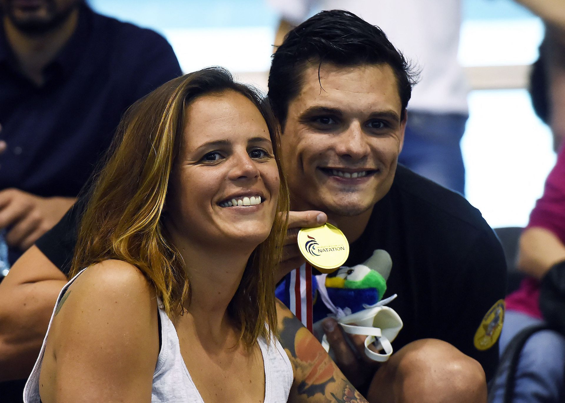 Florent Manaudou poses with his medal next to his sister Laure Manaudou at the final of the French swimming championships. GETTY IMAGES