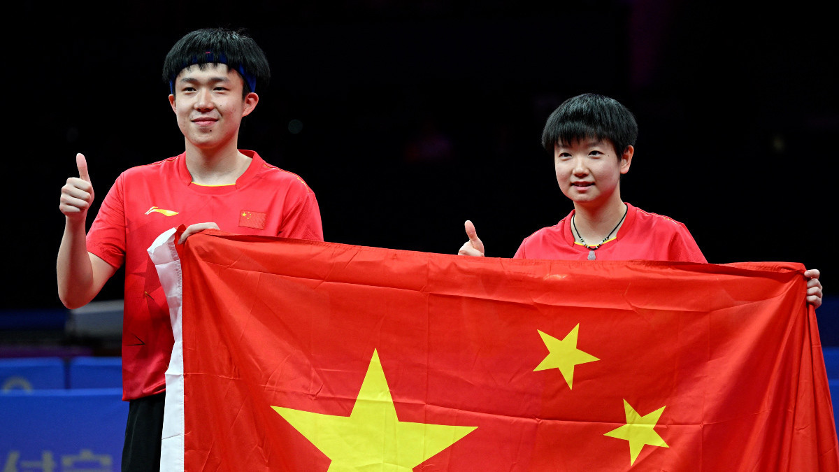 World champions Wang Chuqin and Sun Yingsha head the teams in the Olympic mixed doubles table tennis tournament. JUNG YEON-JE/AFP via Getty Images