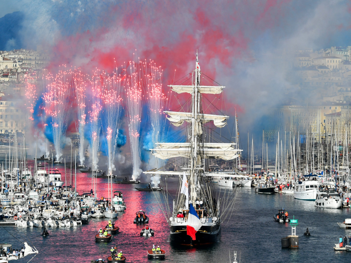 The Olympic torch reaches French soil, lights up Marseille