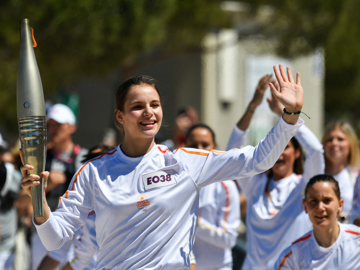 Mariia Vysochanska participates in the Olympic flame relay in Marseille. GETTY IMAGES