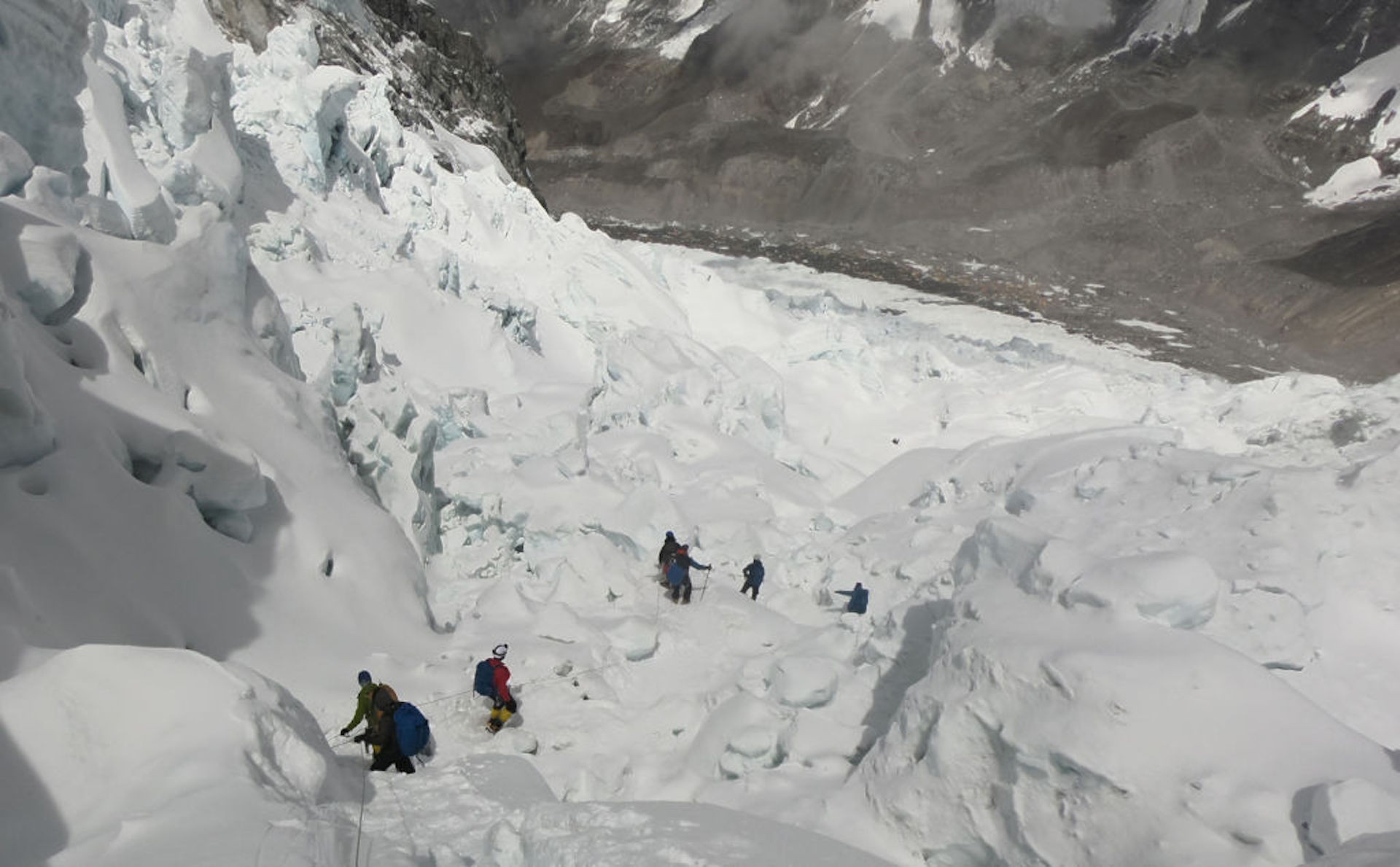 Mountaineers prepare to ascend the south face of Everest from Nepal. Guides are crucial to these expeditions and do most of the dangerous legwork. GETTY IMAGES