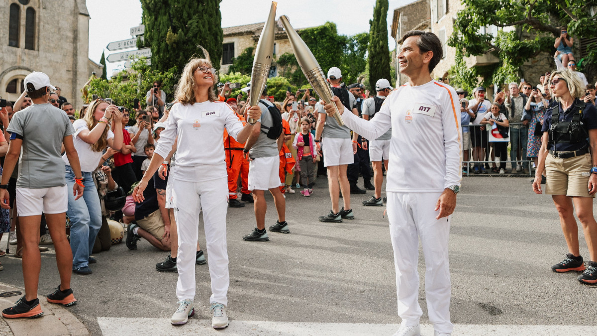 The Olympic Torch continues its journey to Patis 74 days before the Opening Ceremony. PARIS 2024