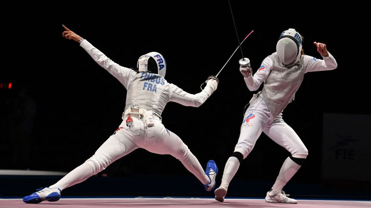 France's Ysaora Thibus compete against Russia's Larisa Korobeynikova in the women's foil individual during the Tokyo 2020. GETTY IMAGES