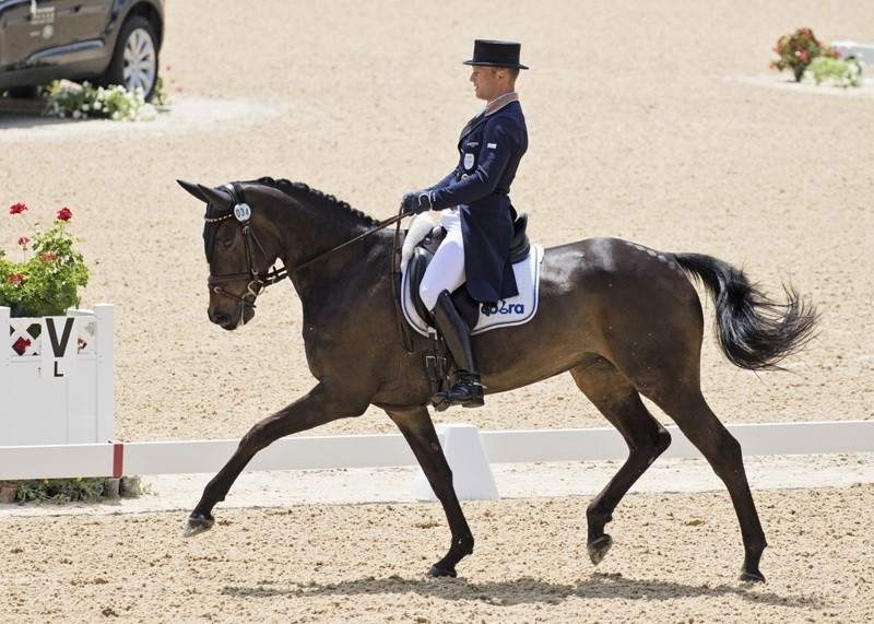 Michael Jung tops the standings at the Kentucky three-day event after the dressage
