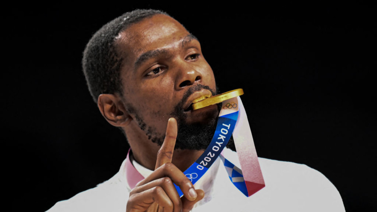 USA's Kevin Wayne Durant celebrates with his gold medal on the podium during the medal ceremony for the men's basketball competition in Tokyo 2020. GETTY IMAGES