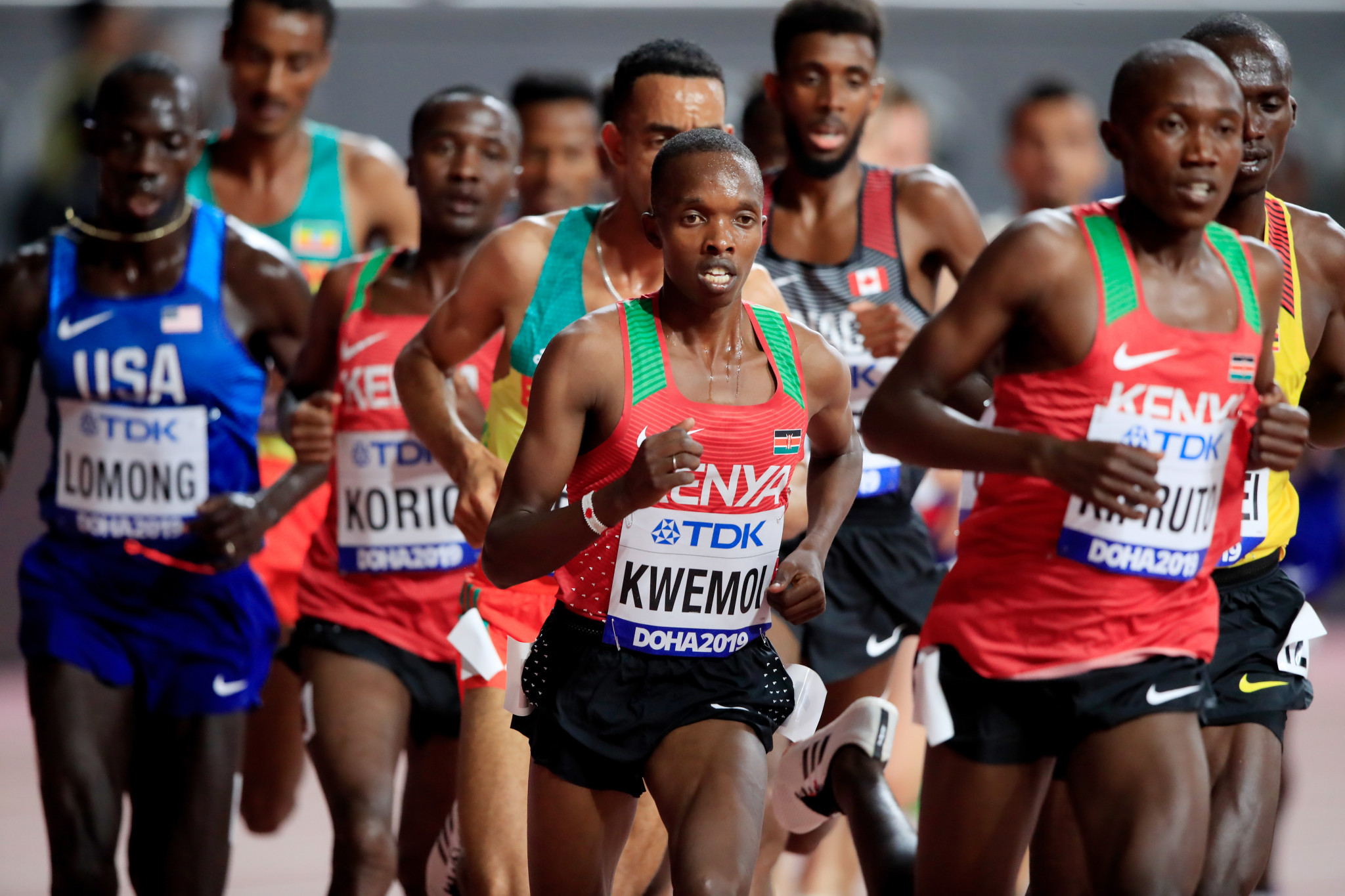 Kwemoi (centre) has been banned for six-years for doping. GETTY IMAGES