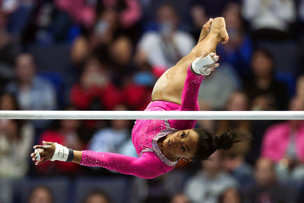 Simone Biles performs at the uneven bars at this year's Core Hydration Classic meet. GETTY IMAGES