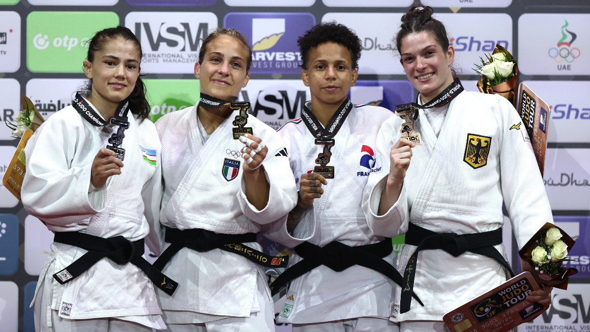The medal winners in the women's 52 kg category. GETTY IMAGES