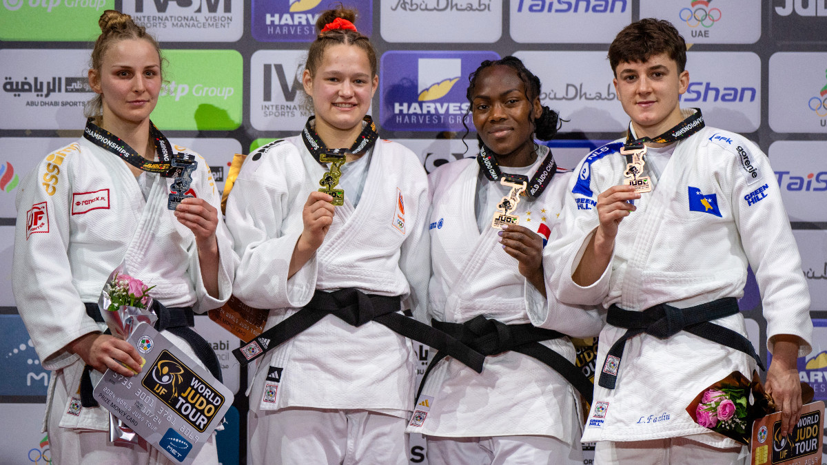 The medallists of the women's 63 kg weight category. GETTY IMAGES