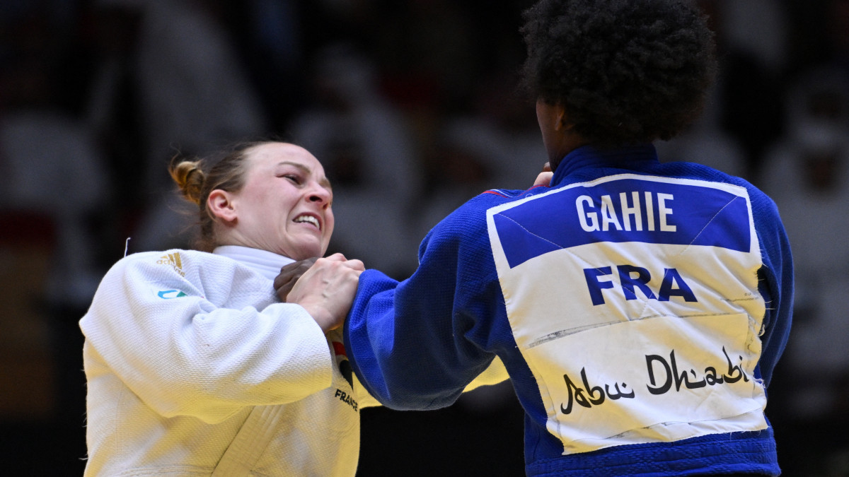 Margaux Pinot (blue) and Marie Eve Gahie of France battling for the gold medal. GETTY IMAGES