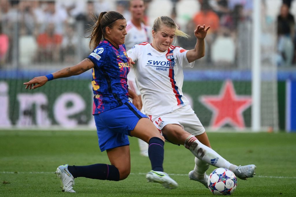 Barcelona's midfielder Patricia Guijarro and Lyon's forward Ada Hegerberg vie for the ball during the 2022 UEFA Womens Champions League Final. GETTY IMAGES
