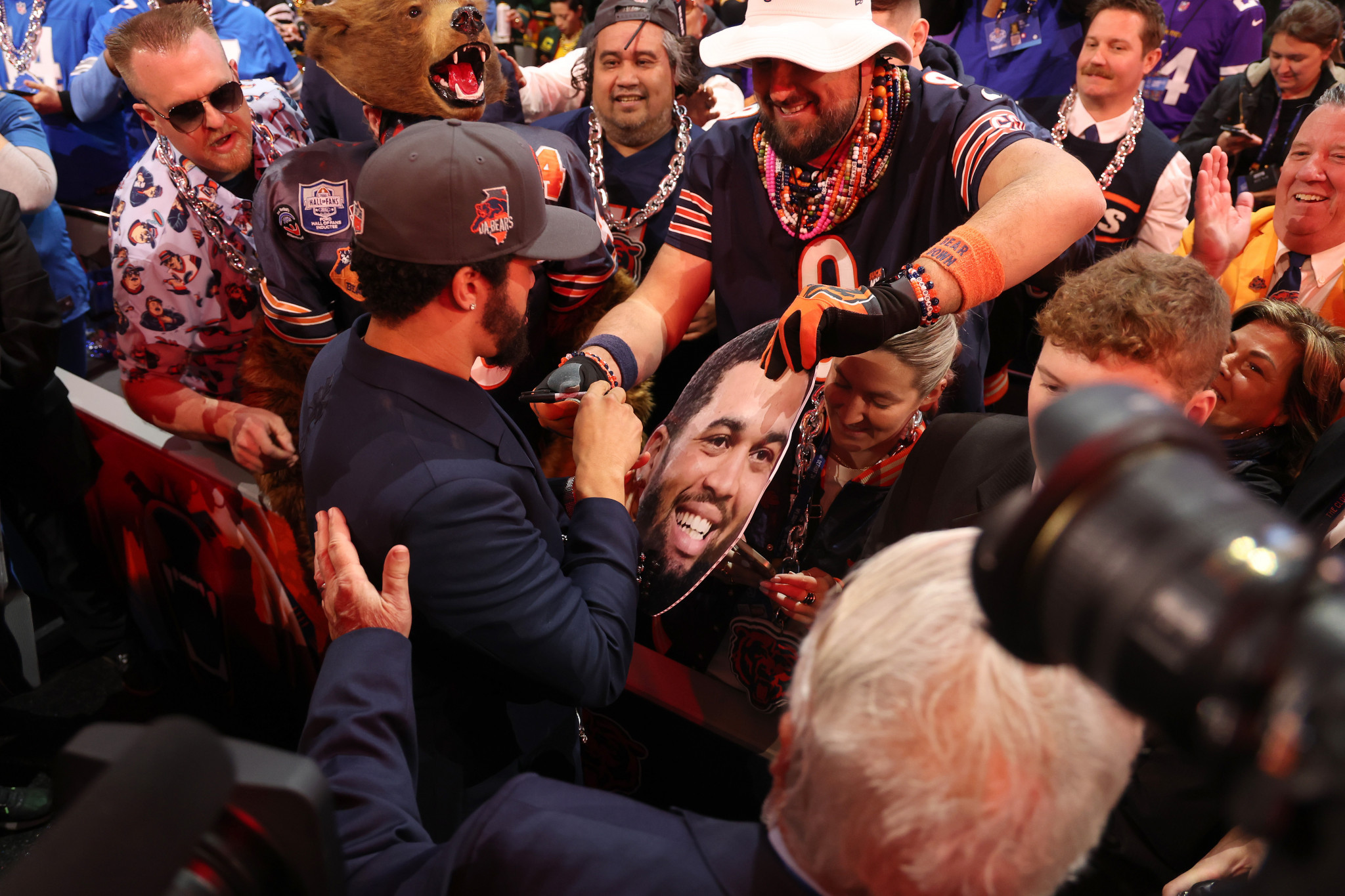 Chicago Bears quarterback Caleb Williams signs autographs at NFL Draft. GETTY IMAGES