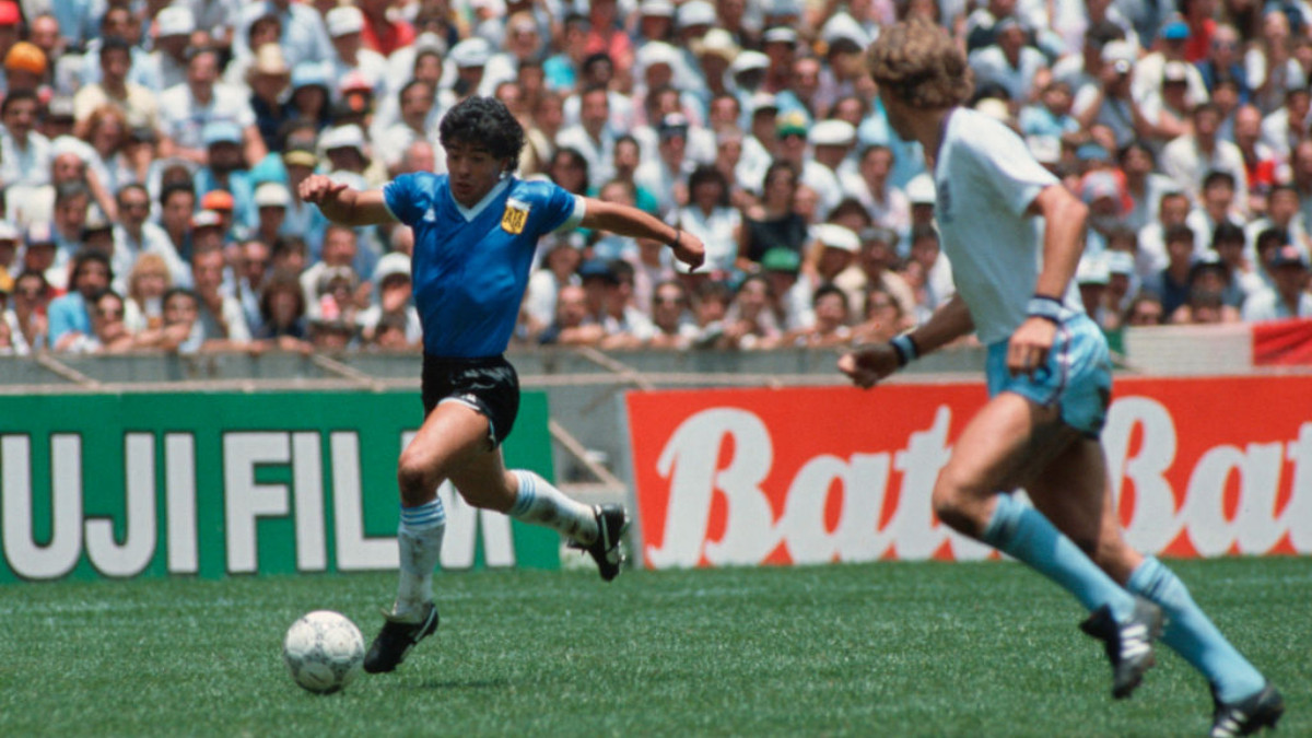 Diego Maradona in action with the player of England during Mexico 1986 World Cup on 22 June 1986. GETTY IMAGES