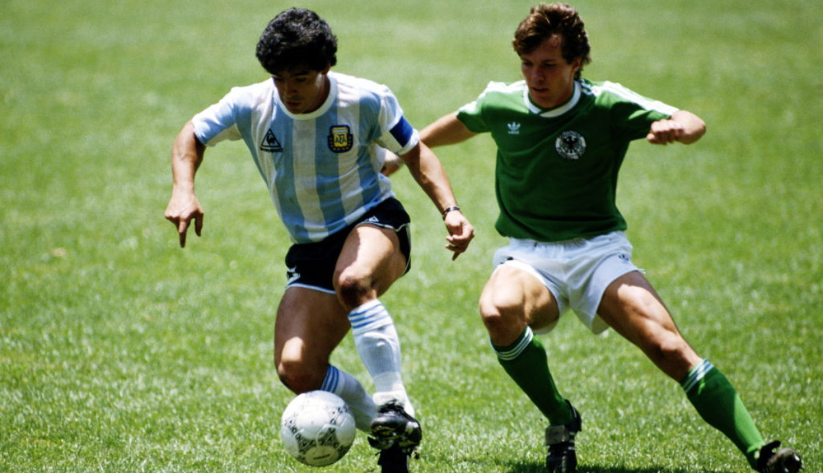 Diego Maradona controls the ball against Lothar Matthäus in the 1986 World Cup final in Mexico. GETTY IMAGES