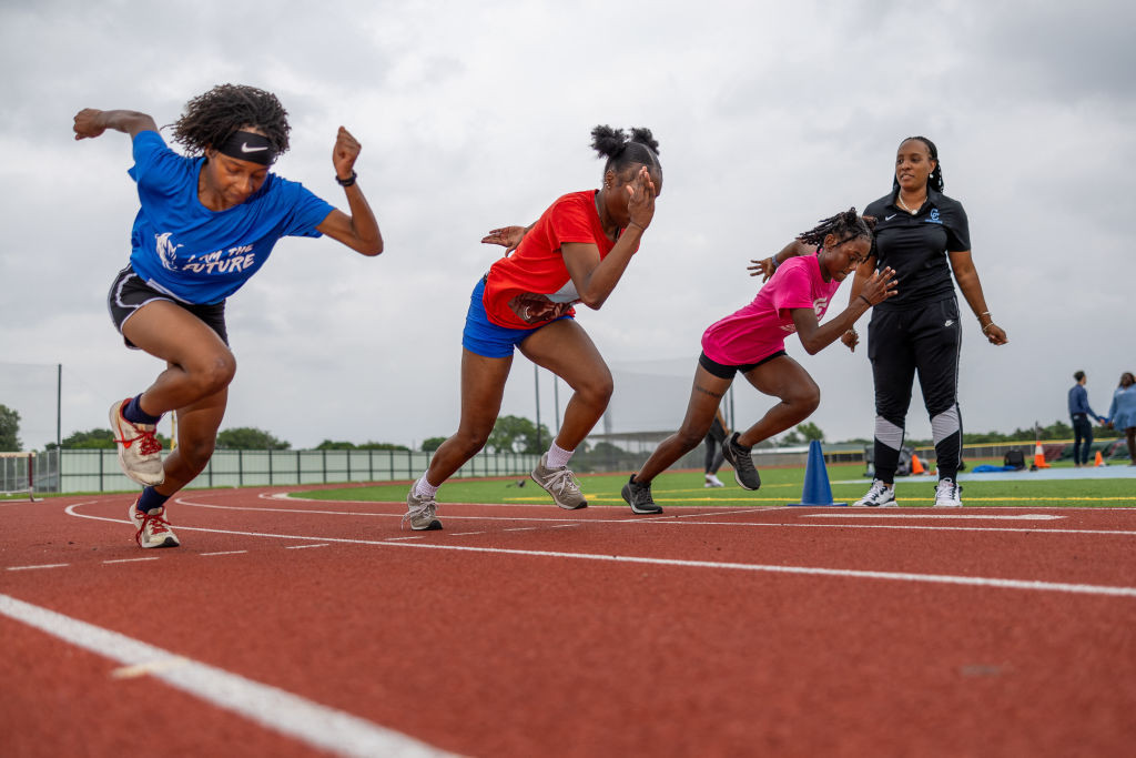 Student athletes practice during a workout with Dallas Carter High School girls track and field coach Lauren Cross at the Sha'Carri Richardson Track. GETTY IMAGES