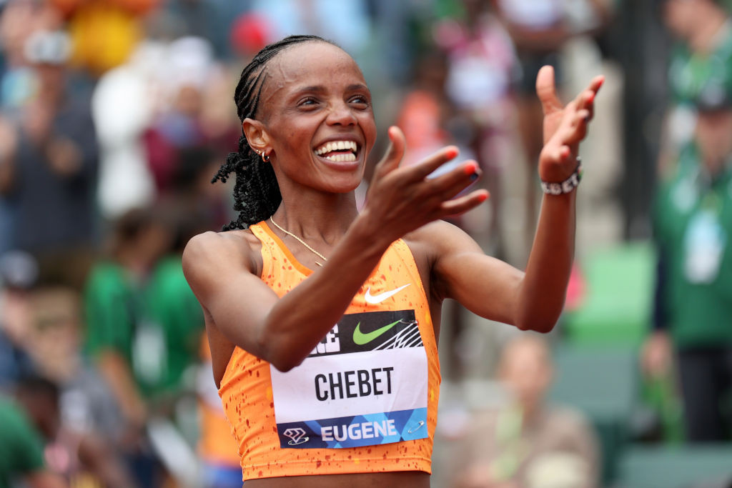 Beatrice Chebet of Team Kenya wins the women's 10,000-meter run with a world record. GETTY IMAGES