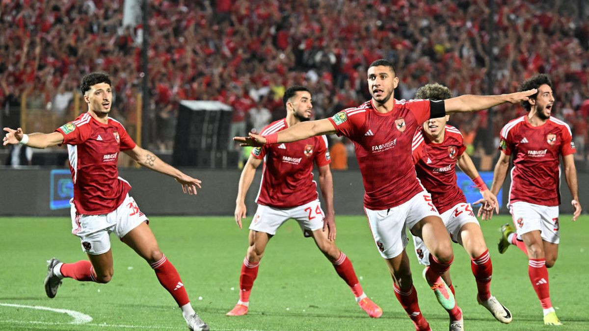 Ahly's players celebrate their team's first goal during the second leg of the CAF Champions League final football match. GETTY IMAGES 