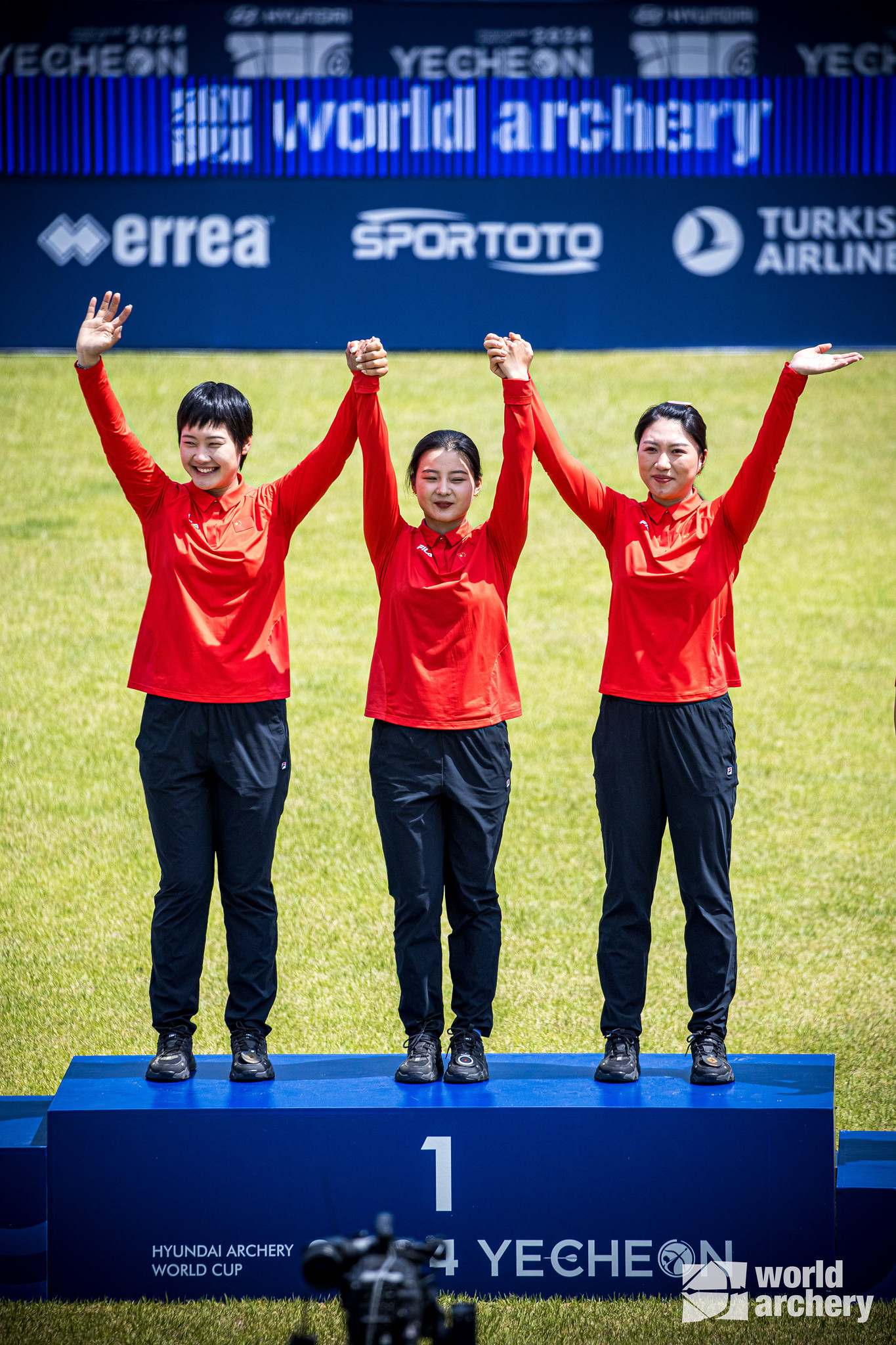 An Qixuan, Li Jiaman and Xu Zhiyun celebrate their win over Korea in women's recurve. WORLD ARCHERY