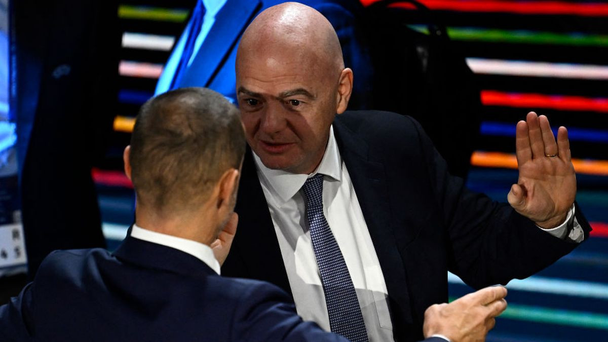 UEFA president Aleksander Ceferin (L) and President of FIFA Gianni Infantino gesture during the 48th UEFA ordinary Congress  in Paris on 8  February 2024. GETTY IMAGES