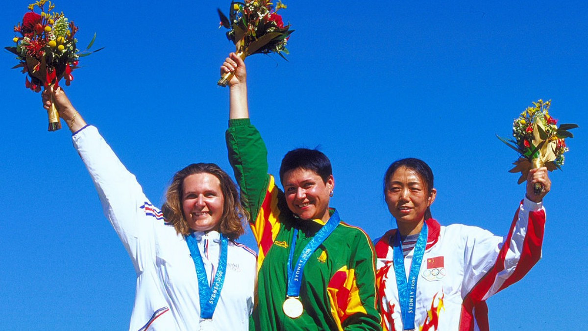 Daina Gudzinevičiūtė on the podium at Sydney 2000. GETTY IMAGES