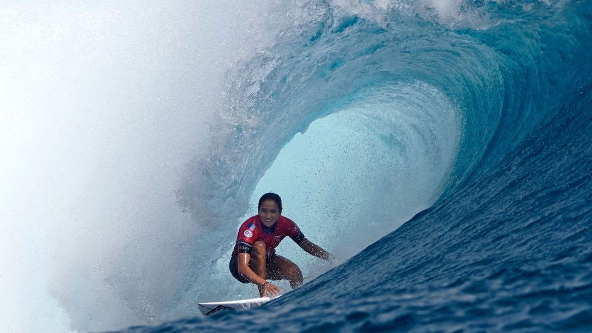 France's surfer Vahine Fierro rides a wave in the World Surf League (WSL) Tahiti pro competition. GETTY IMAGES