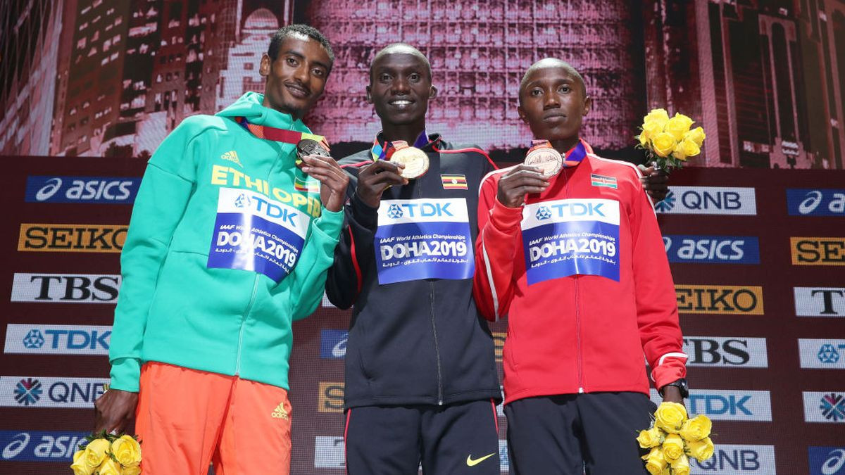  Yomif Kejelcha, Joshua Cheptegei and  bronze medalist Rhonex Kipruto stand on the podium during 17th IAAF World Athletics Championships Doha 2019. GETTY IMAGES 