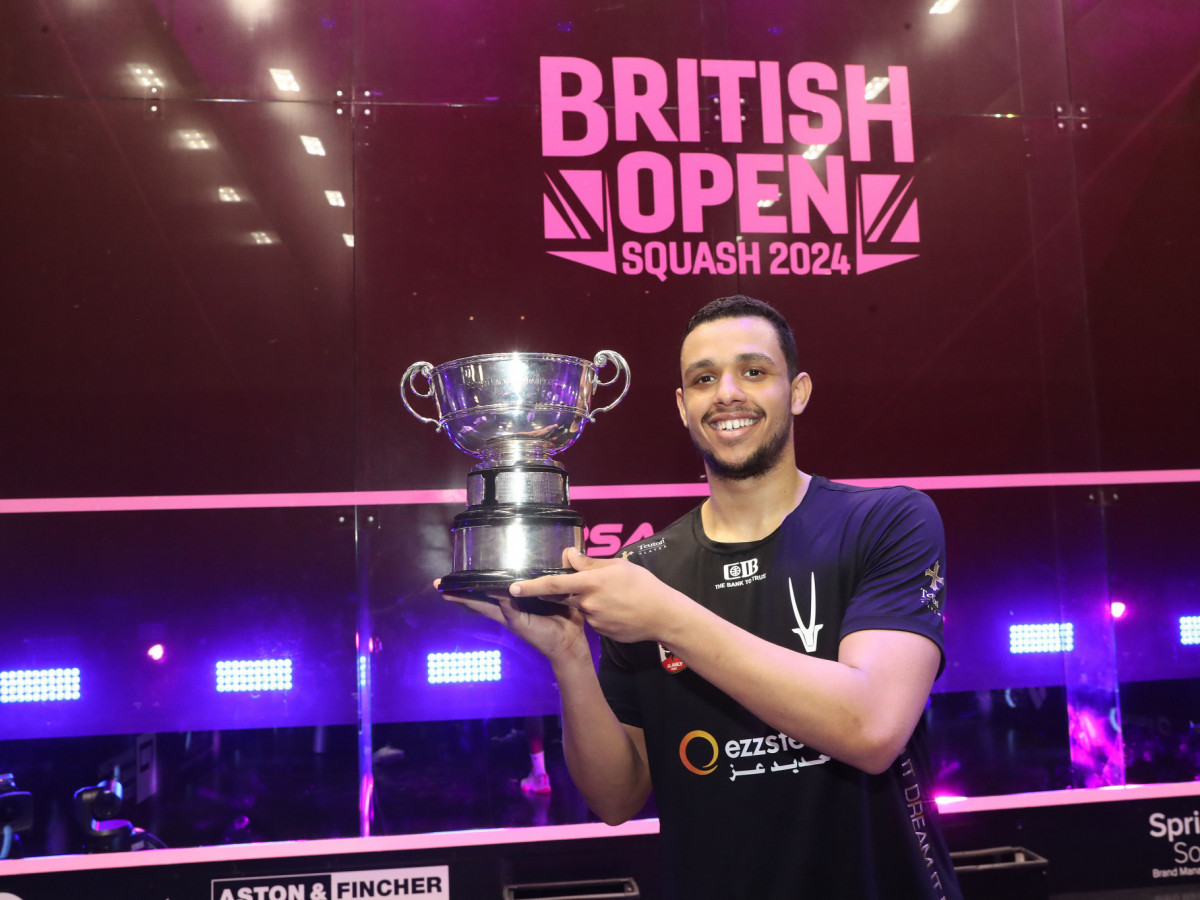 Mostafa Asal posing with the men's trophy at the British Open squash tournament in Birmingham. PSA WORLD TOUR