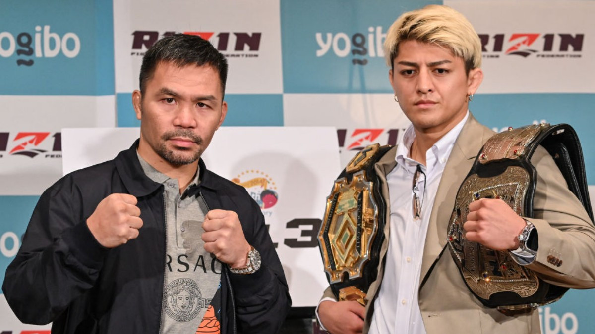 Pacquiao and Suzuki during the promotion of the fight on 28 July. GETTY IMAGES