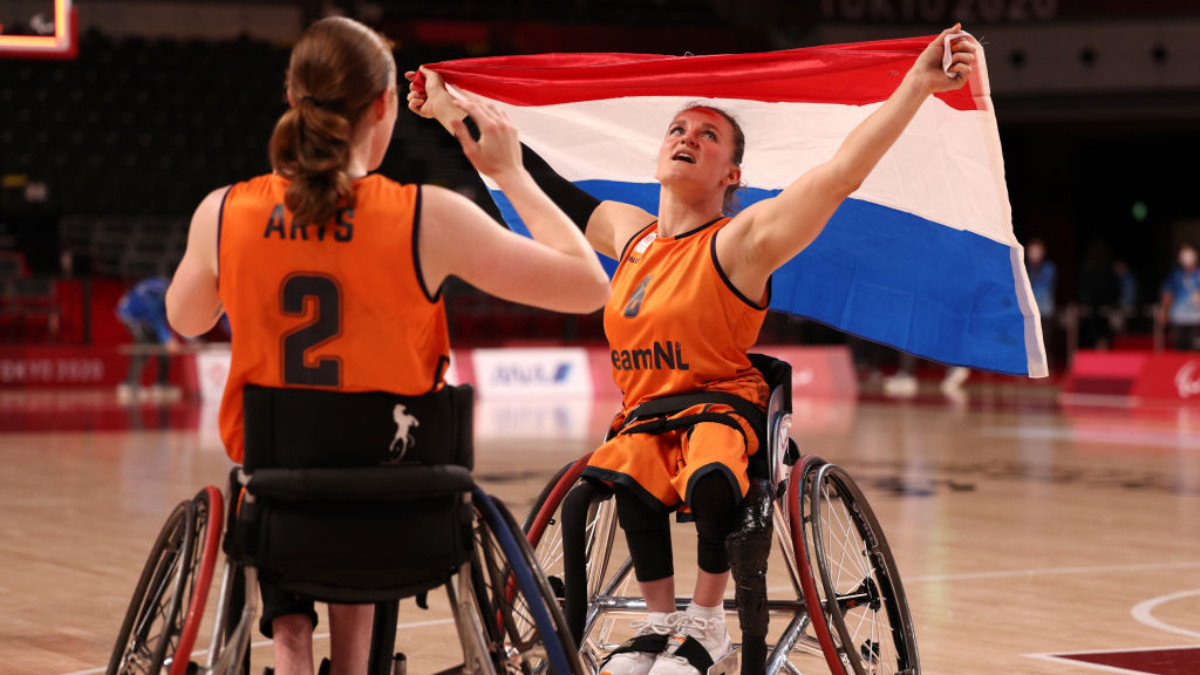 Ilse Arts #2 and Jitske Visser #6 of Team Netherlands celebrate after defeating Team China to win the gold medal during Tokyo 2020 Paralympic Games. GETTY IMAGES
