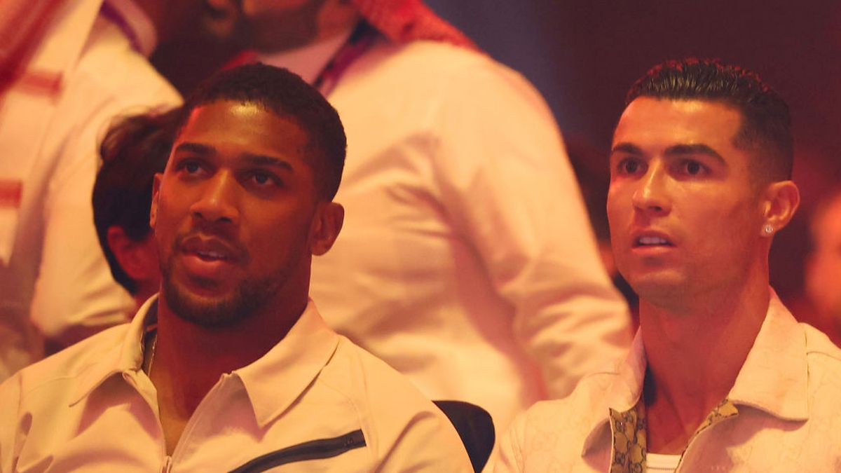 Anthony Joshua and Cristiano Ronaldo watch on during the Ring of Fire card at Kingdom Arena on May 2024 in Riyadh. GETTY IMAGES