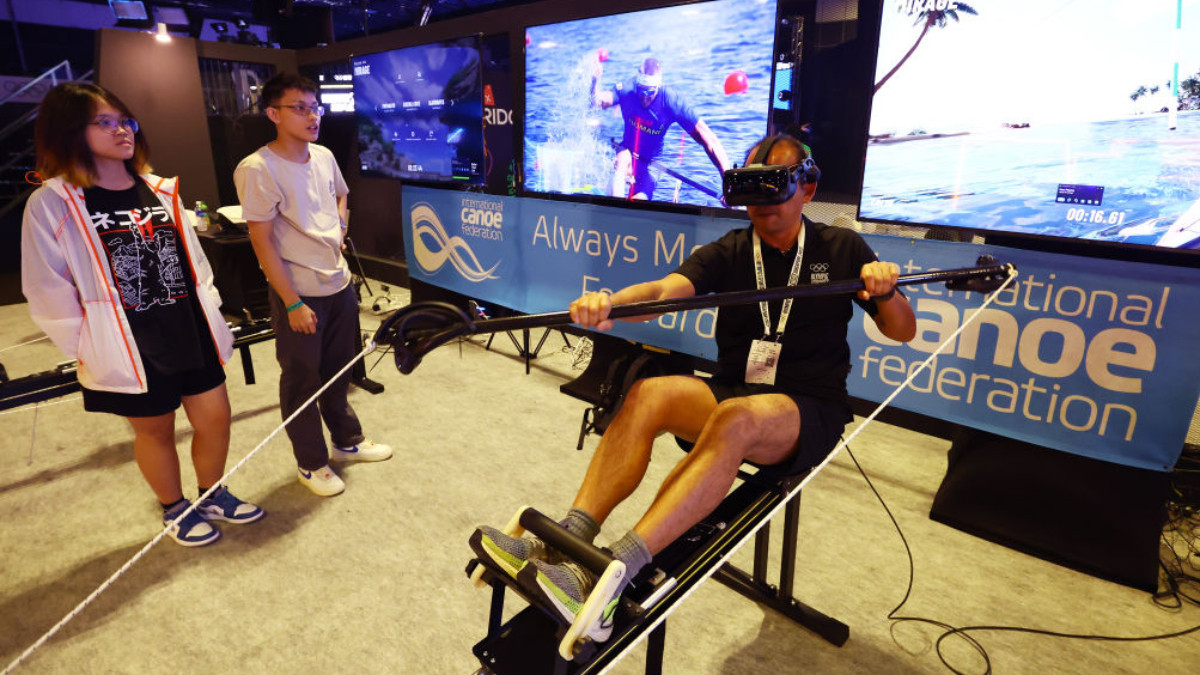 A guest tries out a canoe game in the Free-to-Play Zone on day one of the Olympic Esports Week on June 2023 in Singapore. GETTY IMAGES