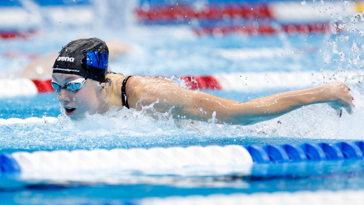Record-breaking Walsh secures Olympic berth with victory in women's 100m butterfly