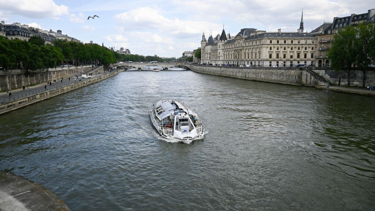 A barge full of tourists, in the seine river, in Paris, on 3 June 2024. GETTY IMAGES