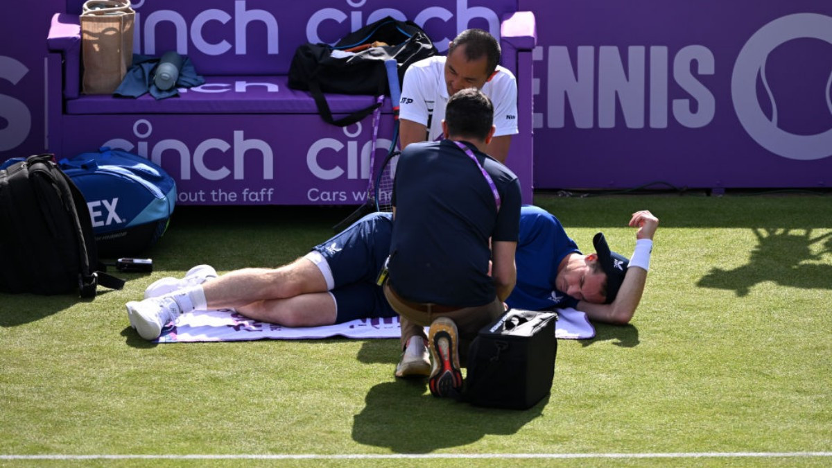 Andy Murray receives medical treatment at Queen's on the day his back forced him to retire. GETTY IMAGES