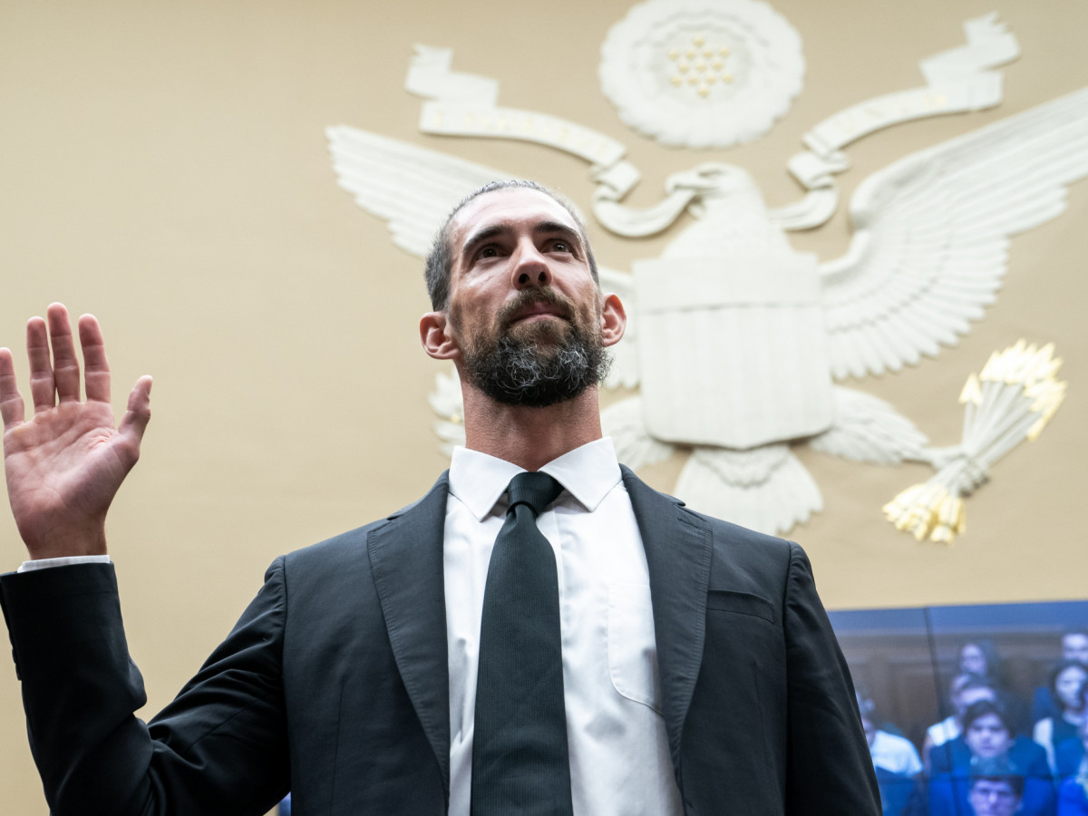 Michael Phelps stands before US Congressional hearing. GETTY IMAGES