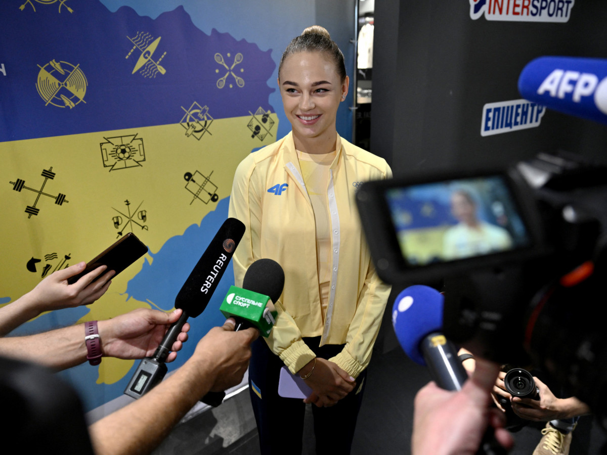 Ukrainian judoka Daria Bilodid speaks to the media. GETTY IMAGES