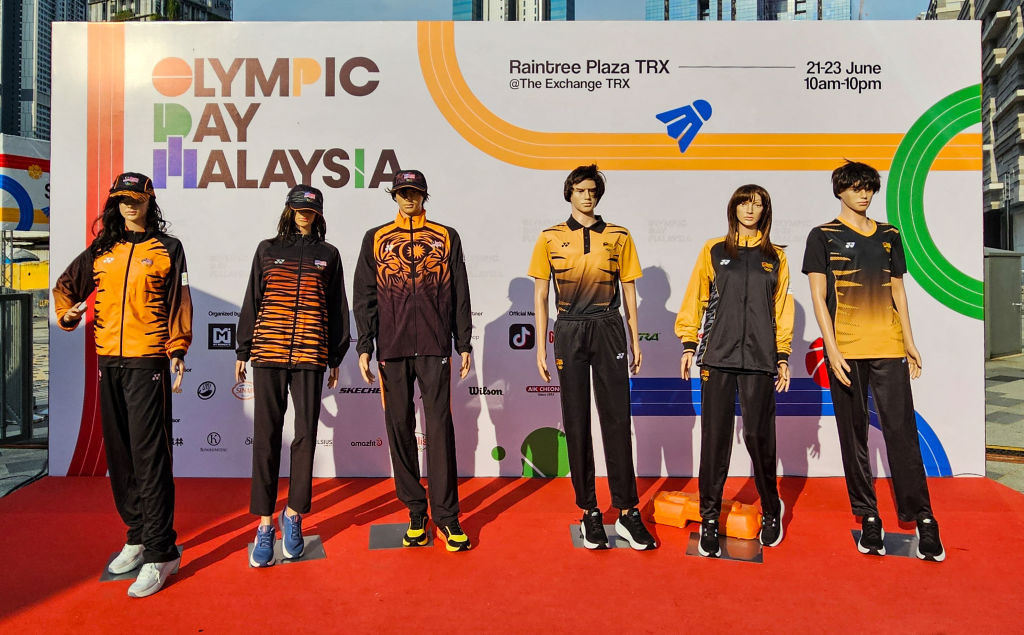 Mannequins displaying the attire for Malaysia's athletes at the Paris 2024 Olympic Games during an event in Kuala Lumpur. GETTY IMAGES