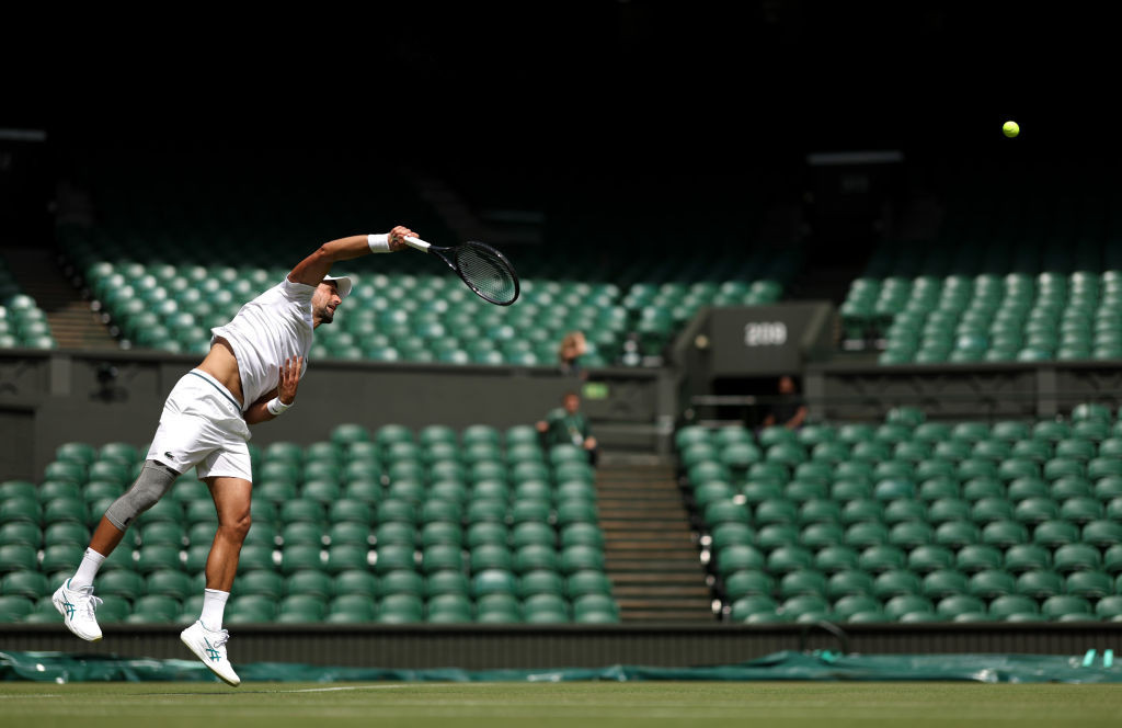 Novak Djokovic of Serbia serves during practice on centre court prior to The Championships Wimbledon 2024. GETTY IMAGES